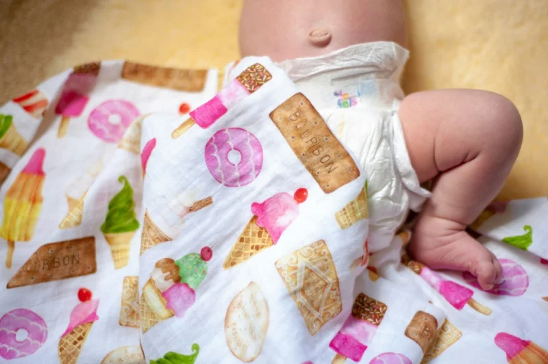 How to swaddle a baby safely — wrapping a newborn in a muslin swaddle step by step